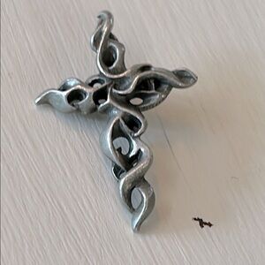 Pewter swirl designed cross pendant signed BSD
